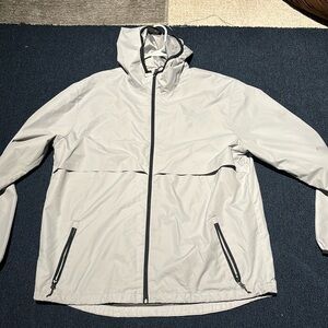 BRAND NEW SILVER XL LIGHTWEIGHT WINDBREAKER!
